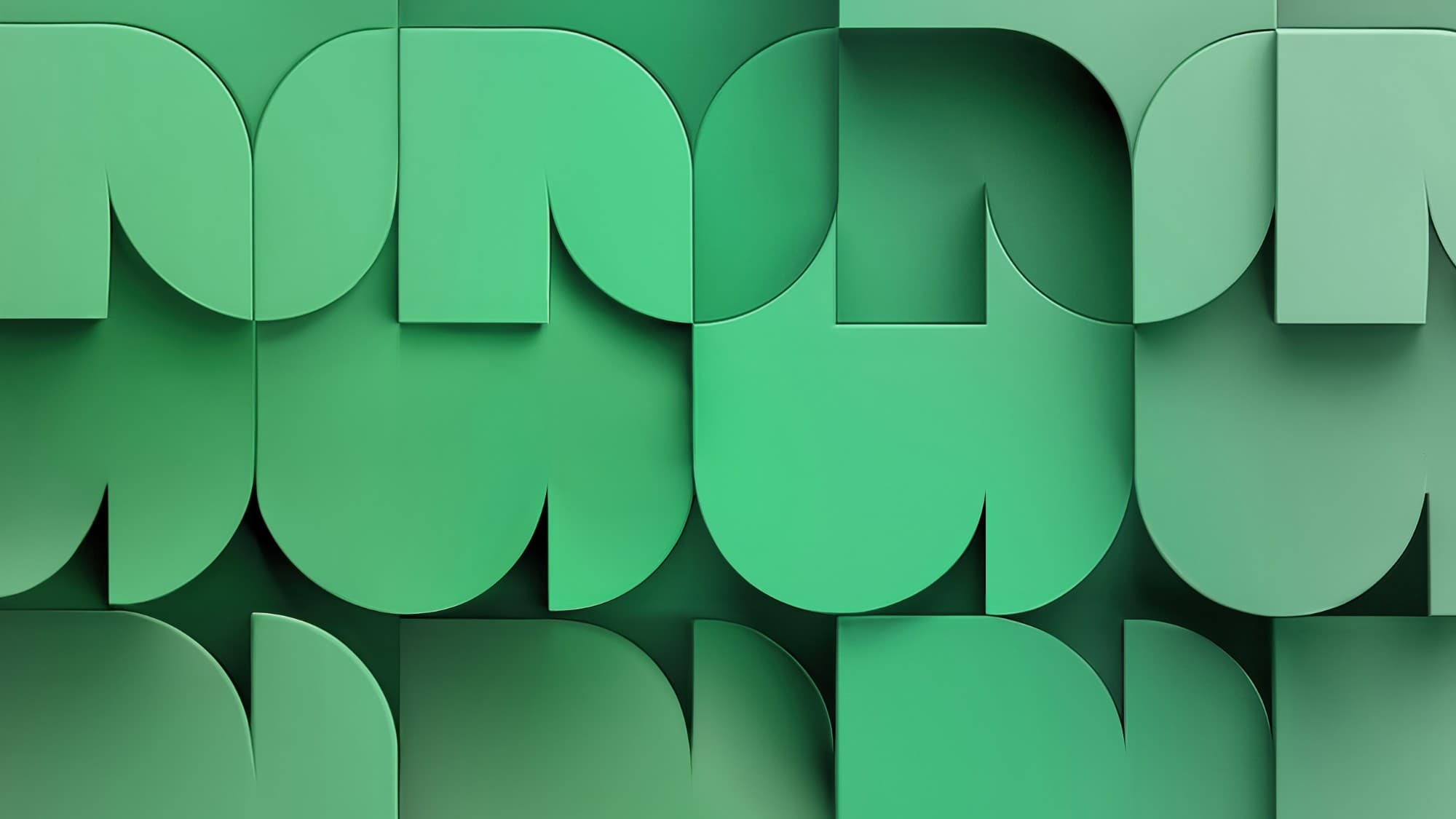 Rows of green geometric tiles with rounded edges and soft shadows